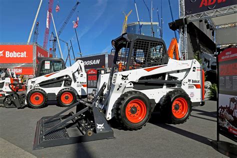 who invented skid steer|bobcat skid steer loader history.